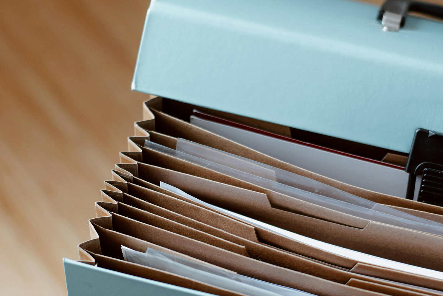 Briefcase showing documents - accounting - monthly recording of transactions including VAT calculations and VAT201 submissions